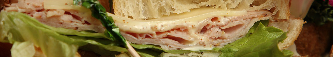 Eating Hawaiian Sandwich at Hawaiian Shave Ice restaurant in Clewiston, FL.